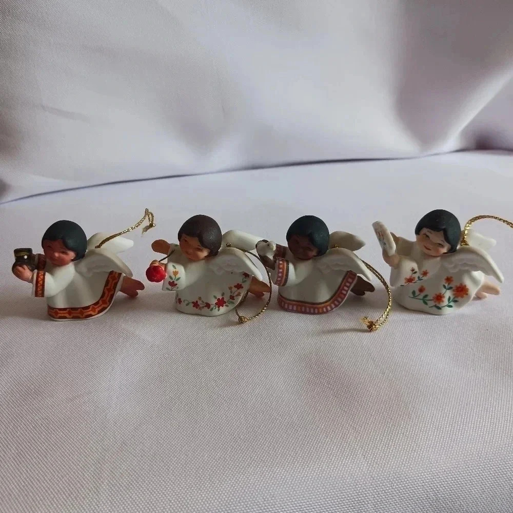 Avon Vtg peace on earth porcelain angel ornaments set of 4